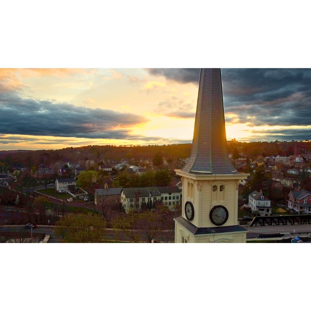 Aerial view of church steeple at sunset over Sellersville, Pennsylvania